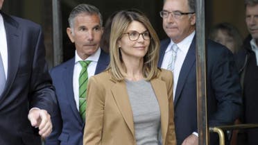 Lori Loughlin exits the courthouse after facing charges for allegedly conspiring to commit mail fraud and other charges in the college admissions scandal at the John Joseph Moakley United States Courthouse in Boston on April 3, 2019. (AFP)
