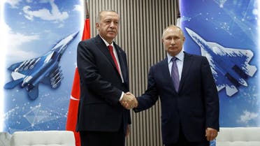 Russian President Vladimir Putin and Turkish President Recep Tayyip Erdogan shake hands during their meeting on the sidelines of the MAKS-2019 International Aviation and Space Salon in Zhukovsky outside Moscow. (Reuters)