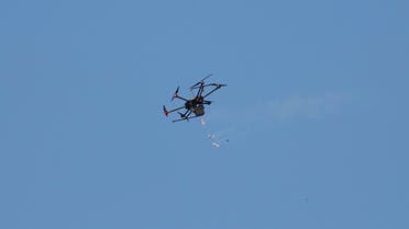 A drone used by Israeli troops fires teargas at Palestinians during a demonstration near the Gaza Strip border with Israel. (File photo: AFP)