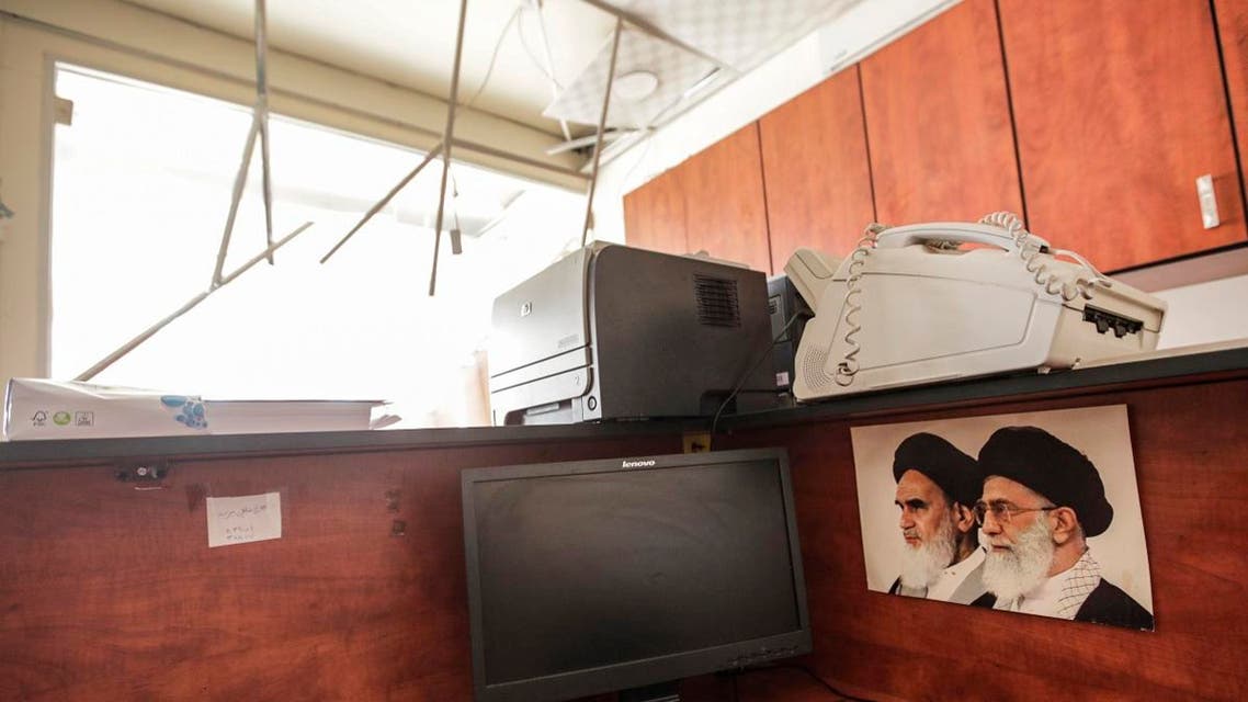 Damage inside a media center of the Lebanese Hezbollah in the south of the capital Beirut, after two drones came down in the vicinity of its building. (AFP)