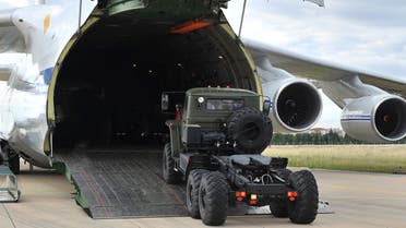 A handout photograph taken and released on July 12, 2019, by the Turkish Defence Ministry shows a Russian military cargo plane, carrying S-400 missile defence system from Russia, during its unloading at the Murted military airbase (also known as Akincilar millitary airbase), in Ankara. The delivery to an air base in Ankara comes after Washington warned this week that there would be real and negative consequences if Turkey bought the defence system. NATO, which counts Turkey as one of its members, has repeatedly warned Turkey that the Russian system is incompatible with other NATO weapons systems, not least the F-35, a new generation multi-role stealth fighter jet.
