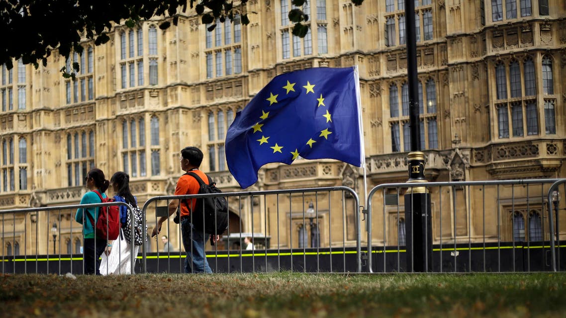 An EU flag is seen near the Houses of Parliament in central London, Wednesday, Aug. 28, 2019. (AP)