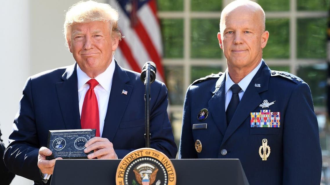 US General John W. Raymond (R) and President Donald Trump pose during an event establishing the US Space Command in the Rose Garden of the White House in Washington, DC, on August 29, 2019. (AFP)