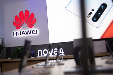 In this photo taken on May 27, 2019, a Huawei logo is displayed at a retail store in Beijing. China is digging in for a tough period of deteriorating ties with the United States, fanning the flames of patriotism with Korean War films, a viral song on the trade war, and editorials lambasting Washington. (File photo)