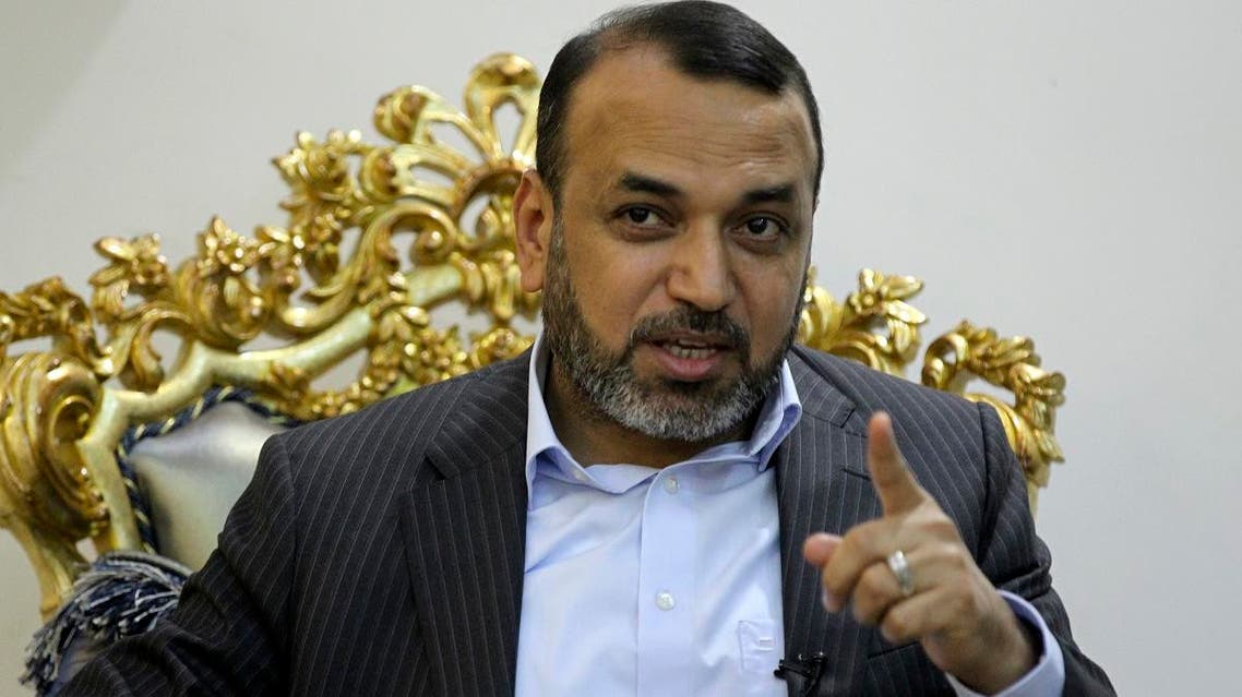 Ahmad al-Assadi, leading member of the Hashed al-Shaabi paramilitary force and parliamentarian, speaks during an interview in Baghdad on August 29, 2019. (AFP)