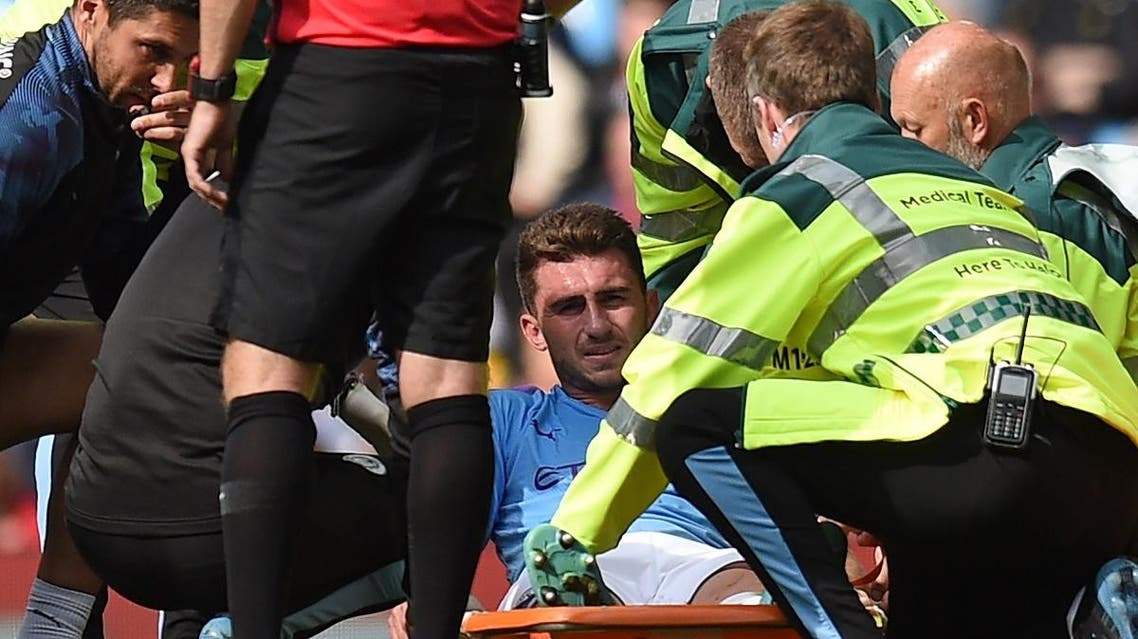 Manchester City's French defender Aymeric Laporte is taken off on a stretcher after picking up an injury, August 31, 2019. (AFP)