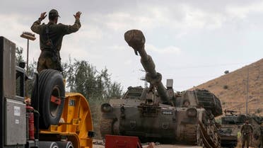 sraeli soldiers unload a self-propelled artillery gun near the Lebanese border outside the northern Israeli town of Kiryat Shemona on August 31, 2019. (AFP)