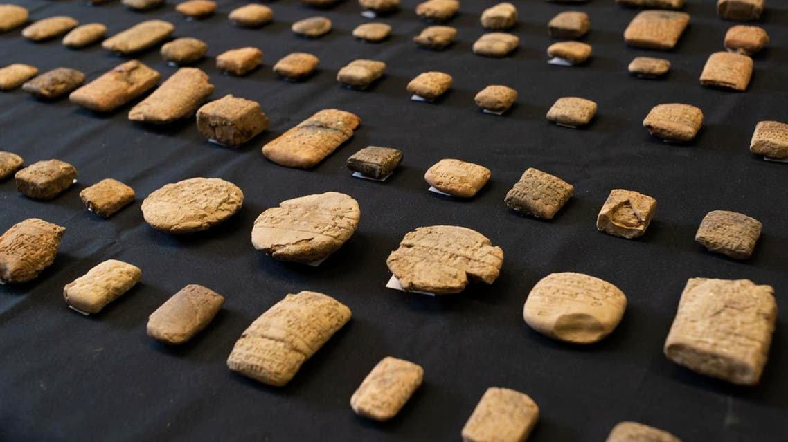 An undated handout picture released by the British Museum in London on August 30, 2019 shows ancient Mesopotamian cuneiform tablets impounded at Heathrow airport in 2011. The British Museum said today it had returned to Iraq a collection of 156 cuneiform tablets believed to have been looted following the US-led invasion of the country. The British Museum / AFP