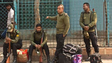 Bangladeshi police personnel with their belongings. (File photo: AP)