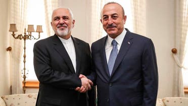 File photo of both Iranian Foreign Minister Mohammad Javad Zarif and Turkish Foreign Minister Mevlut Çavusoglu. (AP)