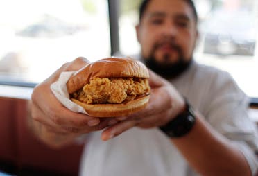 The next time you bite into that chicken sandwich think about when plant-based chicken will replace animal meat. (File photo: AP)