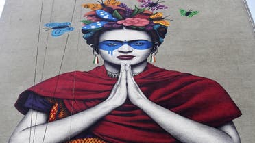 View of Irish urban artist Fin Dac’s mural “Magdalena,” in honor of Mexican painter Magdalena Carmen Frida Kahlo, in the month of her birth, in Guadalajara, Jalisco state, Mexico, on July 14, 2019. (AFP)