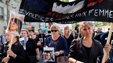 Women hold pictures of victims and placards denouncing the violence against women as they take part in a protest march called by the French association Feminicides par compagnons ou ex (Feminicides by companion or ex) on the opening day of the Grenelle on domestic violence, in Paris, on September 3, 2019. French government launches on September 3, 2019 in Matignon, with the presence of relatives of victims, a Grenelle on domestic violence. The associations hope that it will lead to a Marshall Plan to stop a phenomenon that has already made more than 100 deaths since the beginning of the year.