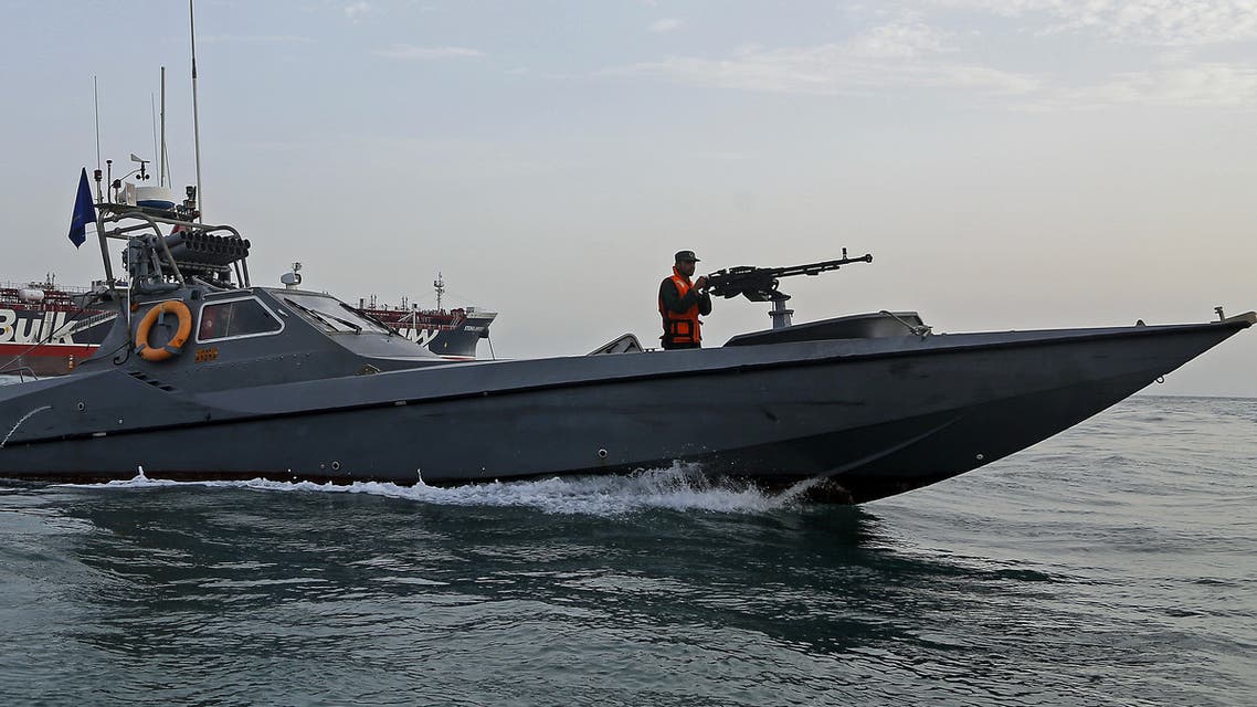 A picture taken on July 21, 2019, shows Iranian Revolutionary Guards patrolling around the British-flagged tanker Stena Impero as it's anchored off the Iranian port city of Bandar Abbas.
