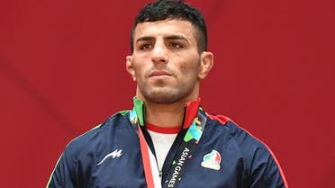 Iran's Saeid Mollaei poses with his gold medal during the podium ceremony for the men under 81kg category of the 2018 Judo World Championships in Baku. (File Photo: Reuters)