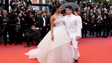 Indian actress and model Priyanka Chopra (L) and US singer songwriter Nick Jonas arrive for the screening of the film "The Best Years of a Life (Les Plus Belles Annees D'Une Vie)" at the 72nd edition of the Cannes Film Festival in Cannes, southern France, on May 18, 2019. (AFP)