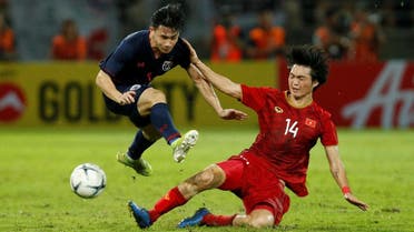 Vietnam's Nguyen Tuan Anh (R) in action against Thailand in the  2022 World Cup held at Thammasat University Main Stadium, Rangsit, Pathum Thani, Thailand, on September 5, 2019.  (Reuters)