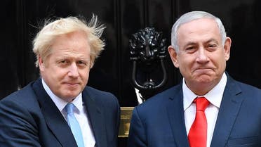 Britain's Prime Minister Boris Johnson (L) greets Israel's Prime Minister Benjamin Netanyahu outside 10 Downing Street in central London on September 5, 2019. (AFP)