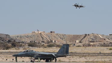 A picture taken on November 16, 2015 shows a Saudi F-15 fighter jet landing at the Khamis Mushayt military airbase, some 880 km from the capital Riyadh, as the Saudi army conducts operations over Yemen. AFP PHOTO / FAYEZ NURELDINE === PHOTO TAKEN DURING A GUIDED MILITARY TOUR ===