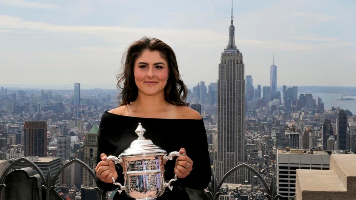 Bianca Andreescu poses with the US Open Women’s singles championship trophy at Top of the Rock, on September 8, 2019, in New York. (AP)