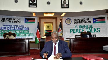 Dr. Gibril Ibrahim, the leader of Justice and Equality movement (JEM), signs the initial agreement on a roadmap for peace talks in Juba