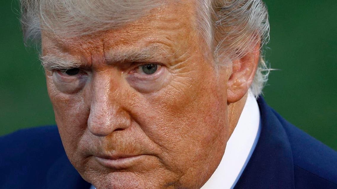 President Donald Trump speaks with reporters before departing on Marine One from the South Lawn of the White House. (AP)