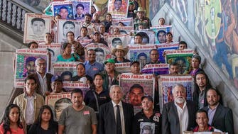 Mexico to probe officials over 2014 case of 43 missing students