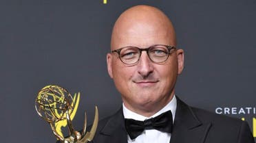 Director Dan Reed poses in the press room with the award for outstanding documentary or nonfiction special for “Leaving Neverland.” (AP)