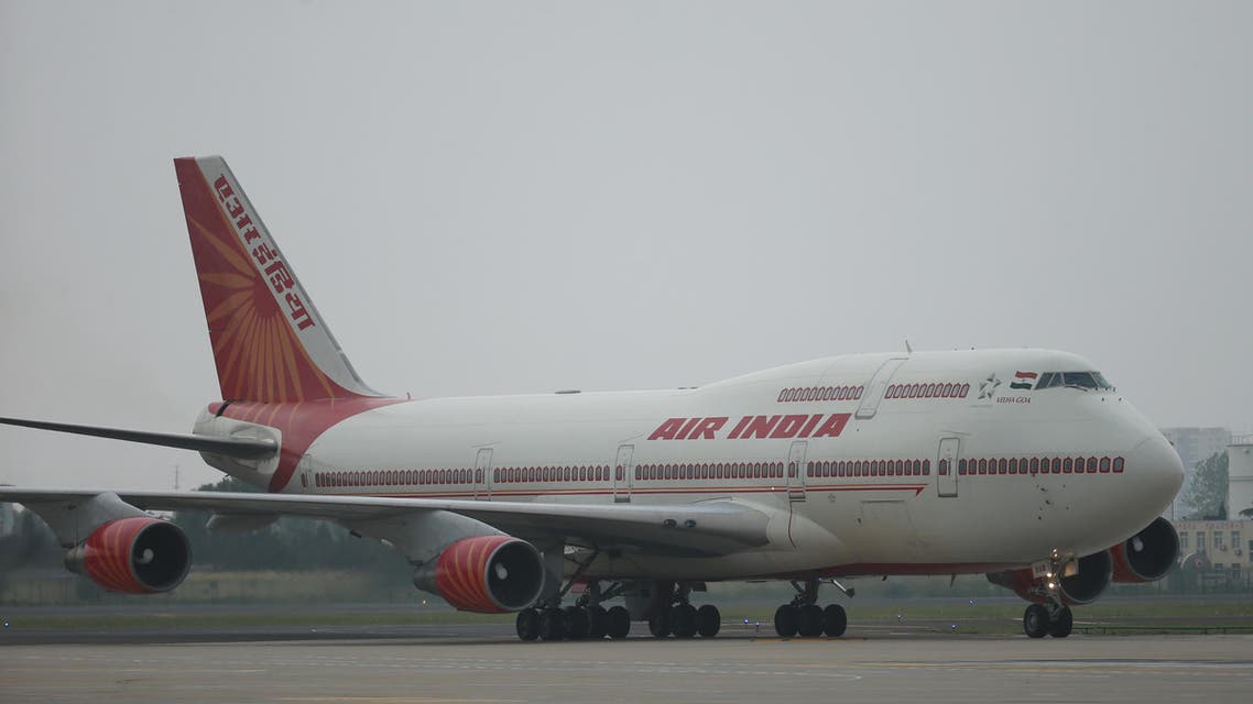An Air India plane carrying Indian Prime Minister Narendra Modi arrives at Qingdao Liuting International Airport for the 18th Shanghai Cooperation Organization (SCO) Summit in Qingdao, in China's Shandong province on June 9, 2018. The two-day Shanghai Cooperation Organisation (SCO) is a regional security bloc led by China and Russia.