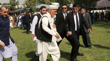 Ashraf Ghani bodyguards speech afghanistan president walking tour - AP
