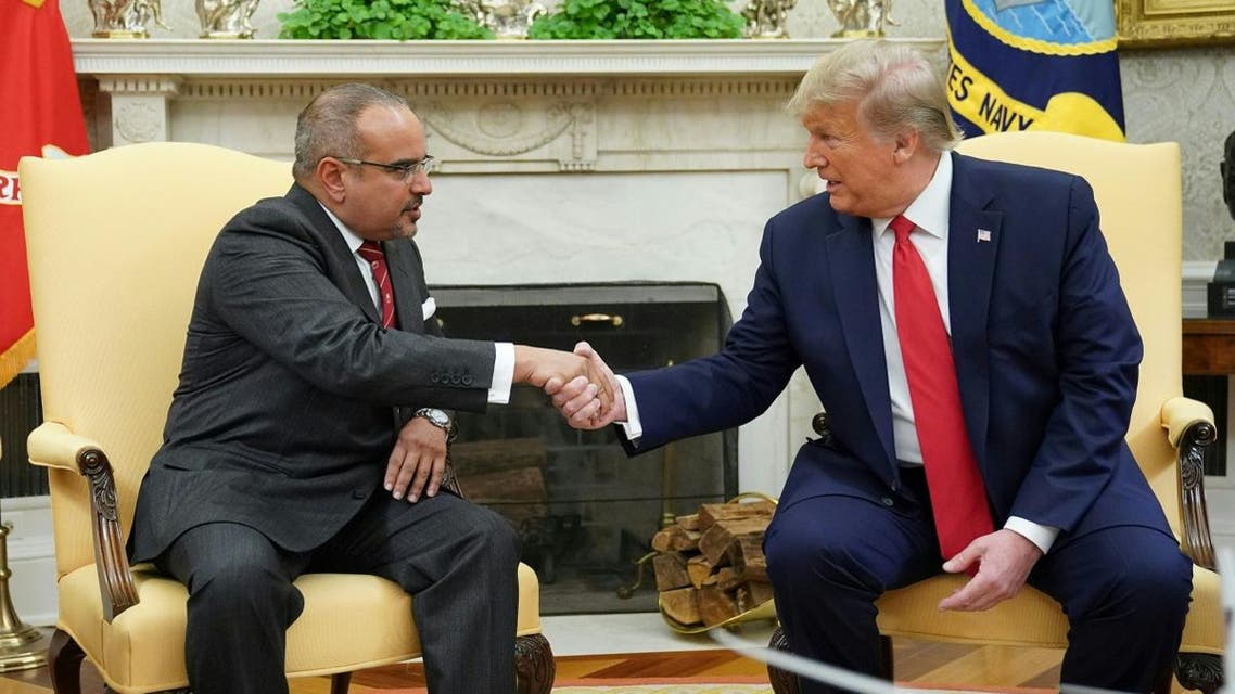 US President Donald Trump (R) shakes hands with Bahrain's Crown Prince Salman bin Hamad bin Isa al-Khalifa during a meeting in the Oval Office of the White House on September 16, 2019 in Washington, DC. (AFP)