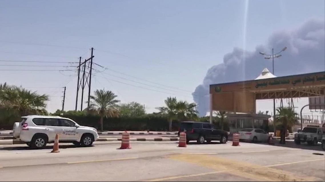This AFPTV screen grab from a video made on September 14, 2019, shows smoke billowing from an Aramco oil facility in Abqaiq about 60km (37 miles) southwest of Dhahran in Saudi Arabia's eastern province. (AFP)