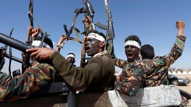 Newly recruited Houthi militants chant slogans as they ride a military vehicle during a gathering in the capital Sanaa. (File photo: AFP)
