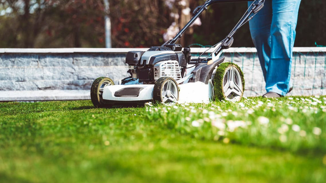 mowing grass قص العشب جز العشب