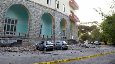 Damaged cars outside the Faculty of Geology building after an earthquake in Tirana, on September 21, 2019.  (AP)