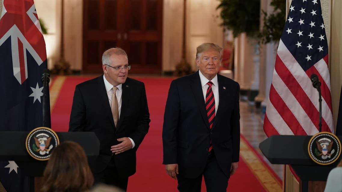 US President Donald Trump and Australian Prime Minister Scott Morrison arrive at a press conference in the East Room of the White House in Washington, DC, on September 20, 2019.
