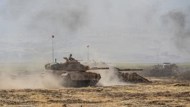 Turkish soldier ride armoured vehicles near the Habur crossing gate between Turkey and Iraq during a military drill on September 27, 2017 in the Silopi district, southeast Turkey. Iraqi soldiers on September 26 took part in a Turkish military drill close to the Iraqi border on Tuesday, an AFP photographer said, a day after Iraq's Kurdish region held a vote on independence.