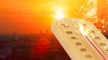 Summer hot weather season high temperature thermometer with city view. stock photo