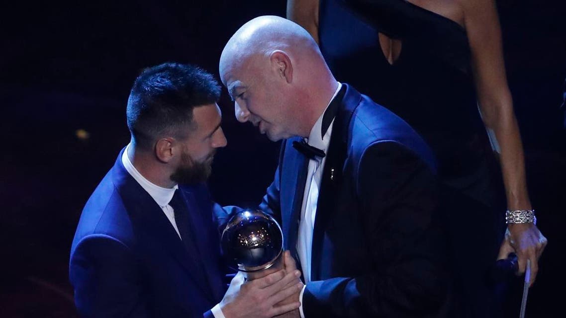 Argentinian Barcelona player Lionel Messi receives the Best FIFA mens player award from FIFA president Gianni Infantino during the ceremony of the Best FIFA Football Awards, in Milan's La Scala theater, northern Italy, Monday, Sept. 23, 2019. (AP)