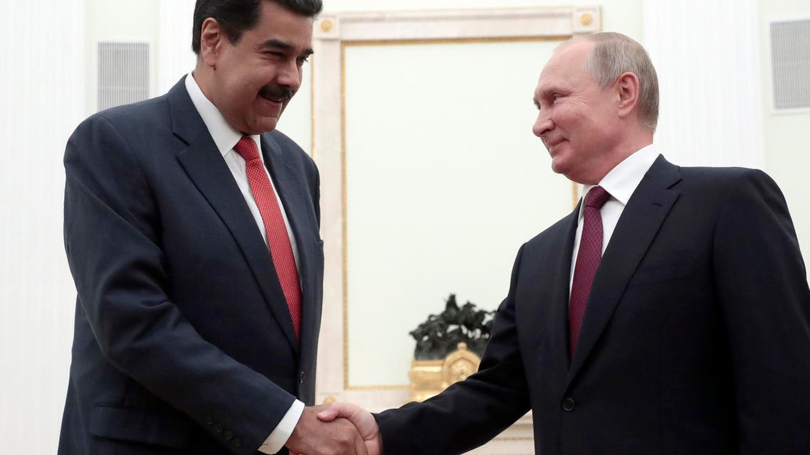 Russian President Vladimir Putin, right, shakes hands with Venezuela's President Nicolas Maduro during their meeting in the Kremlin in Moscow, Russia, Sept. 25, 2019. (AP)