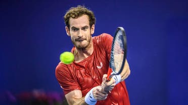 Andy Murray of Britain hits a return against Alex de Minaur of Australia during their men's singles second round match at the Zhuhai Championships tennis tournament in Zhuhai in China's southern Guangdong province on September 26, 2019. STR / AFP