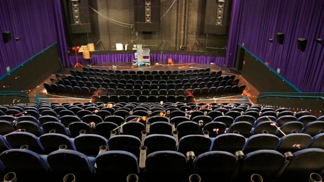 In this this July 2012 evidence photo, which the Arapahoe County District Attorney's Office released shows the Colorado movie theater with bullet holes following the July 20, 2912, attack by James Holmes in Aurora, Colo. (