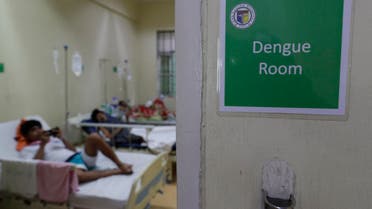 Filipino patients stay inside the dengue room at the San Lazaro government hospital in Manila, Philippines on Wednesday, Aug. 7, 2019. (AP)