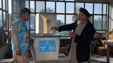 An Afghan man casts his ballot at a polling station in Parwan provence on September 28, 2019. (AFP)