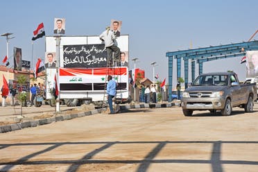 معبر القائم الحدودي بين العراق وسوريا (فرانس برس)