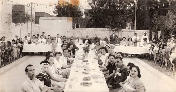Jewish families celebrating the Sukkot holiday at a recreational club in Sudan. (via Tales of Jewish Sudan)