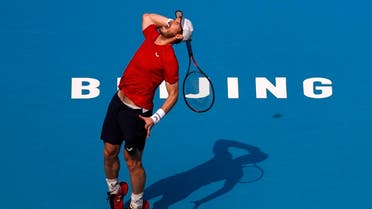 Andy Murray of Britain prepares to serve against his compatriot Cameron Norrie during their second round of the men's singles match in the China Open. (AP)