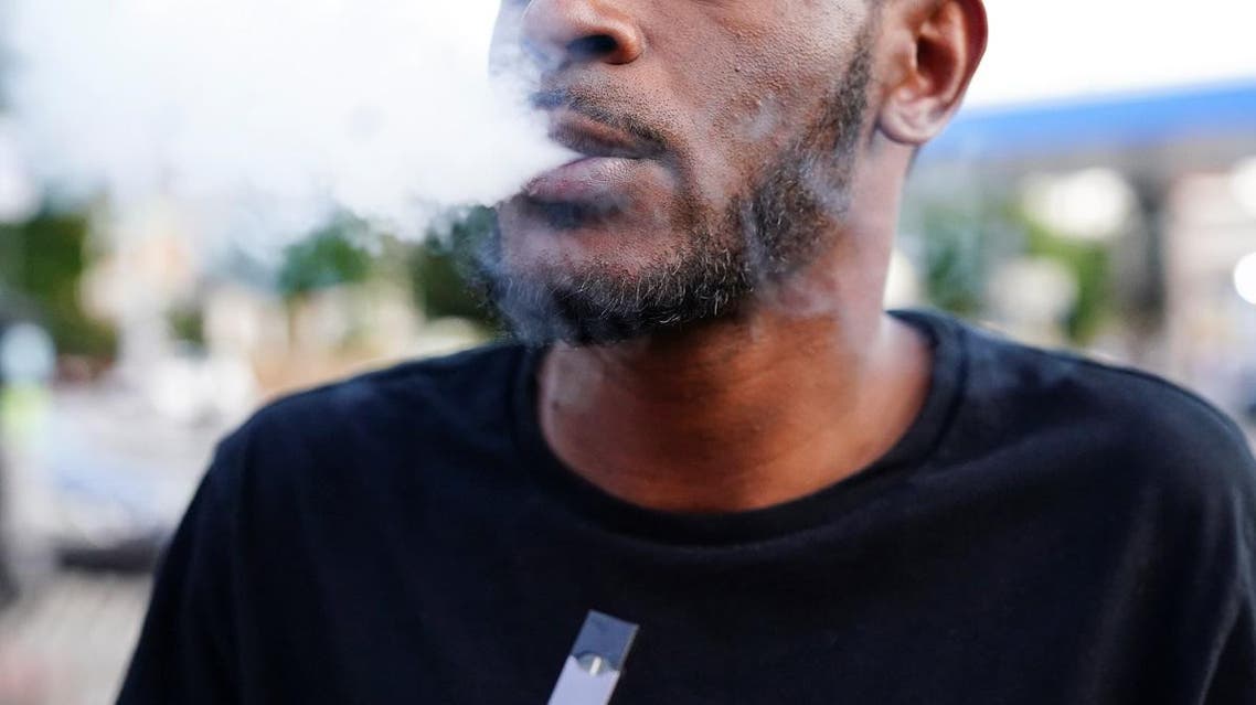 A man uses a Juul vaporizer in Atlanta, Georgia. (Reuters)
