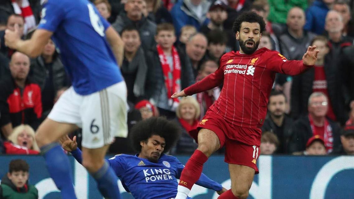 Leicester City’s Hamza Choudhury fouls Liverpool’s Mohamed Salah during English Premier League soccer match in Anfield stadium in Liverpool, England, on Oct. 5, 2019. (AP)