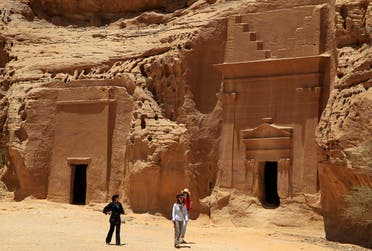 In this photograph made on Thursday, May 10, 2012, foreign tourists visit a Nabataean tombs complex in the desert archaeological site of Madain Saleh, in Al Ula city, 1043 km (648 miles) northwest of the capital Riyadh, Saudi Arabia. (File photo: AP)